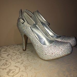 Silver rhinestone pumps